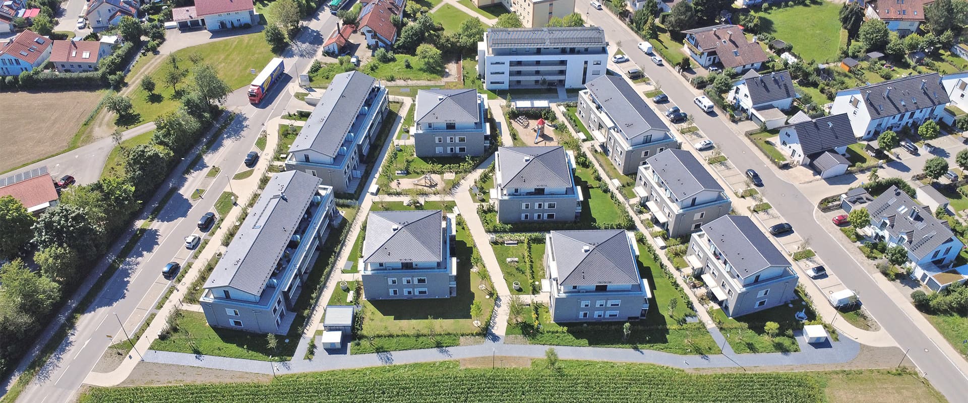 Apfelwiese. Wohnanlage Putzbrunn bei München