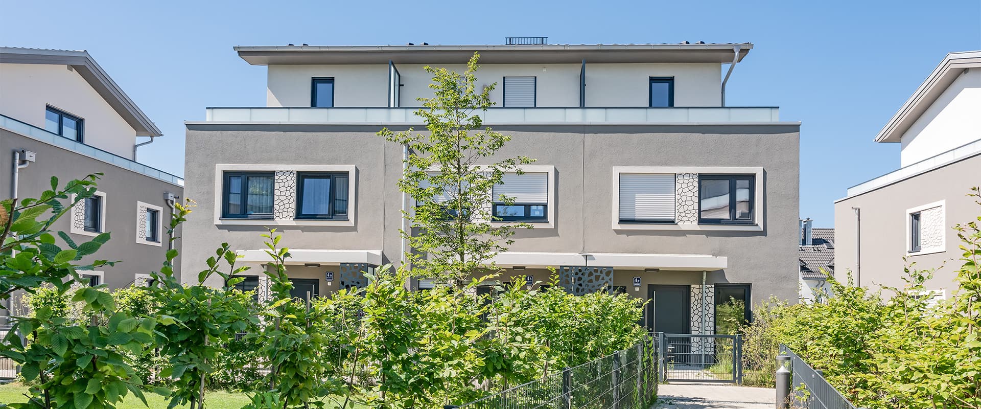 Apfelwiese. Wohnanlage Putzbrunn bei München