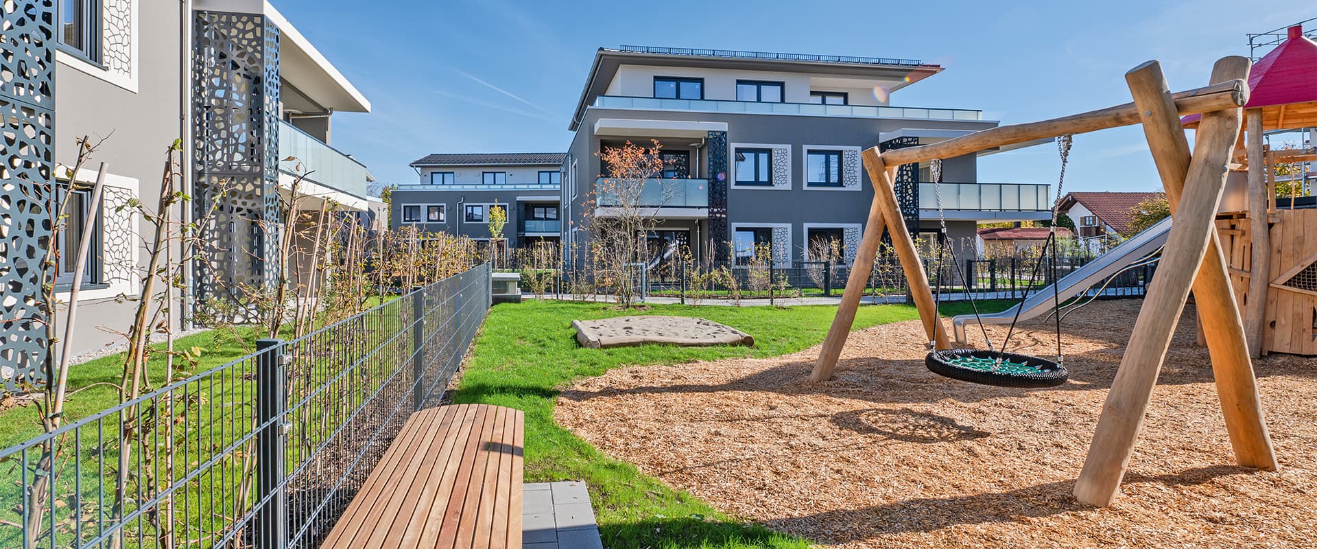 Apfelwiese. Wohnanlage Putzbrunn bei München